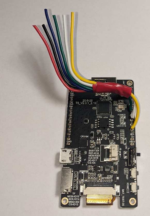 LILYGO® TTGO T5 board with 6 lengths of wire routed and bundled together.
