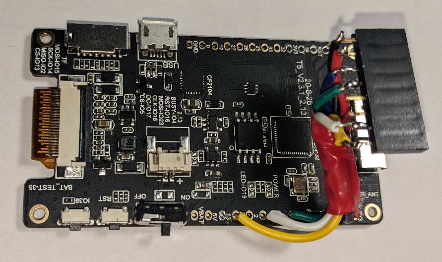 LILYGO® TTGO T5 board with 6 lengths of wire routed and bundled together.